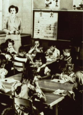 Vintage black and white photo of students in a classroom