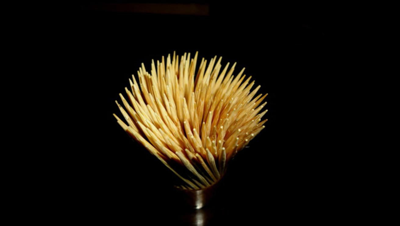 tooth pick with black background