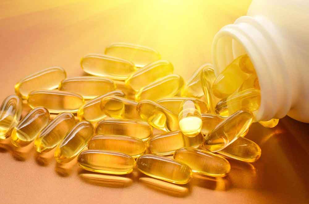 vitamins with gold background