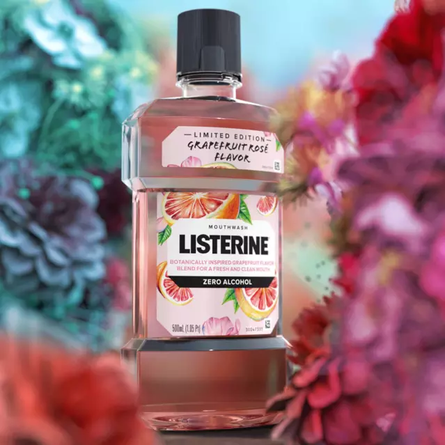 Listerine Grapefruit Rose bottle surrounded by colorful wildflowers