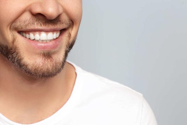Man with white teeth smiling